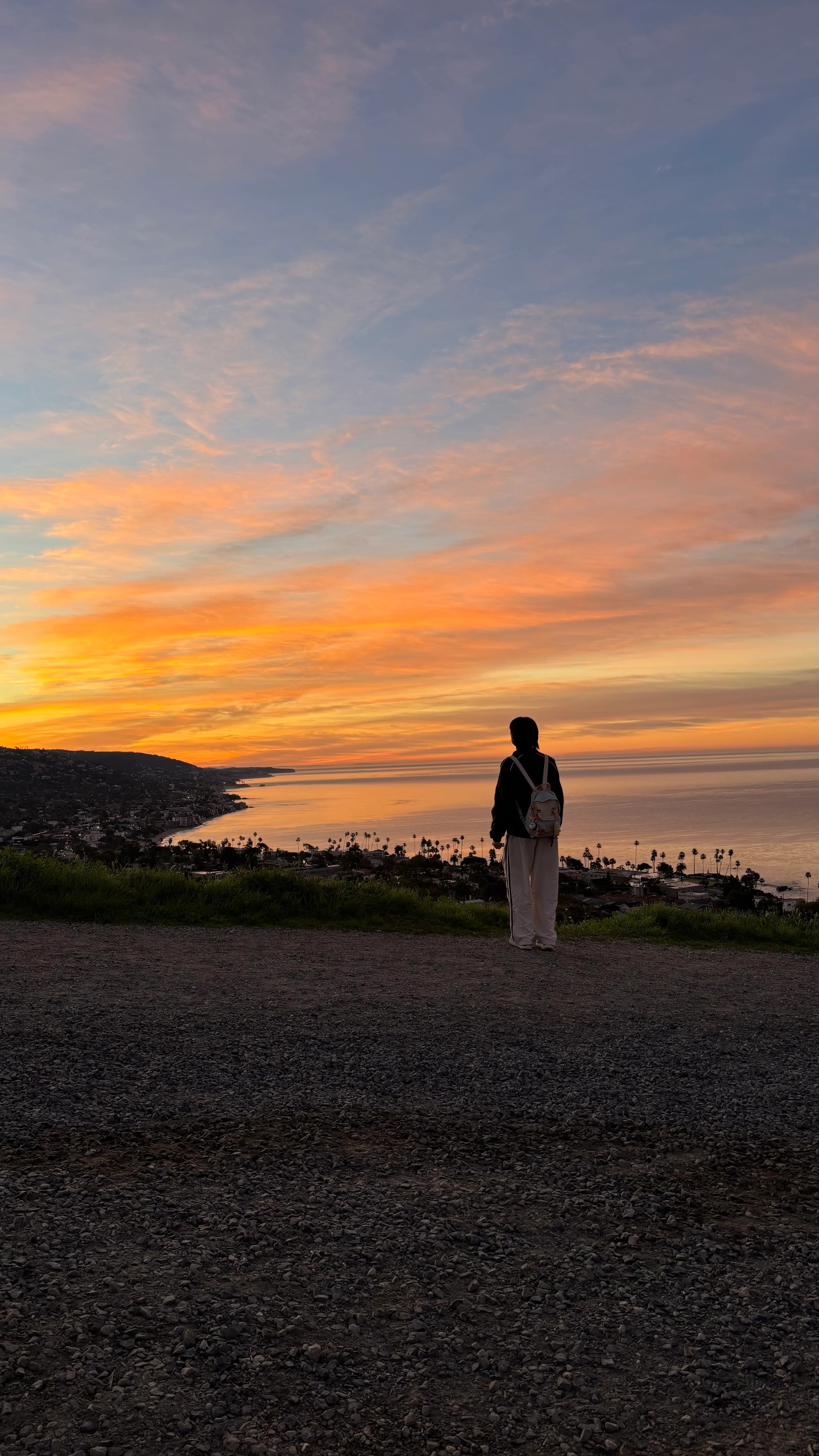 Watching the sunset during a hike from a cliff
